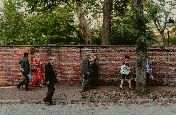 Physick-Hill House and Powel House Wedding | Guests walking from cocktails to dinner down historic city streets | Philadelphia | Flowers by Love 'n Fresh Flowers | Photo by Chellise Michael Photography