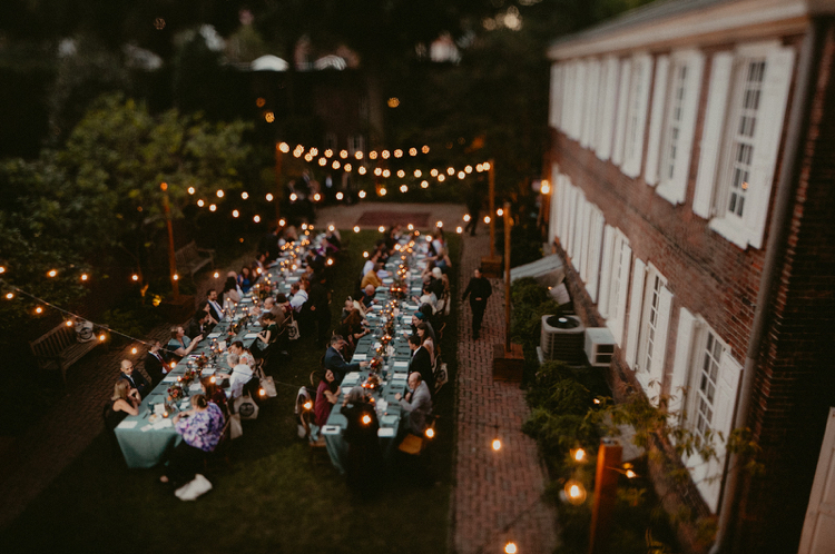 Powel House Wedding Reception | Long Dinner Tables in the Garden under Market Lights | Philadelphia | Flowers by Love 'n Fresh Flowers | Photo by Chellise Michael Photography