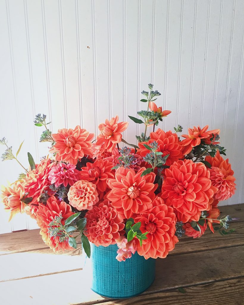 Pantone Color of the Year Living Coral Floral Inspiration for Weddings | Coral and orange centerpiece grown by Love 'n Fresh Flowers in Philadelphia