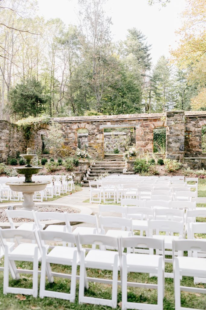 Parque at Ridley Creek Wedding | Philadelphia | Romantic ceremony in the walled garden with a fountain | Photo by Emily Wren Photography | Flowers by Love 'n Fresh Flowers