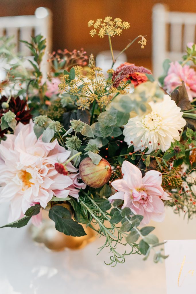 Parque at Ridley Creek Wedding | Philadelphia | Autumn seasonal centerpiece featuring blush dahlias, cream dahlias, eucalpytus, figs, and herbs in a gold compote | Photo by Emily Wren Photography | Flowers by Love 'n Fresh Flowers