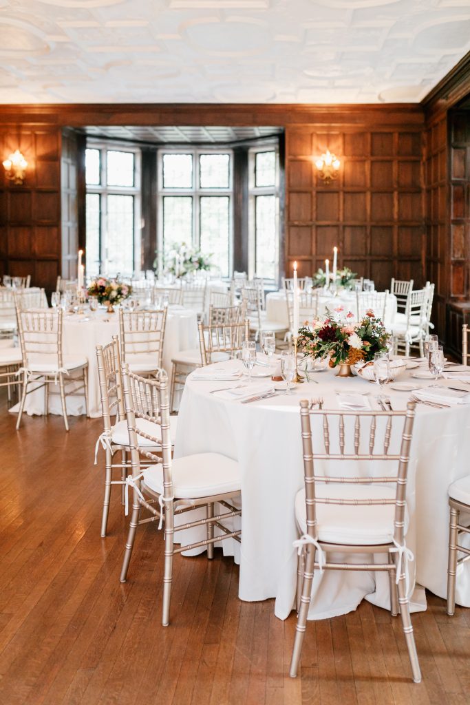 Parque at Ridley Creek Wedding | Philadelphia | Reception Space with lush autumn floral decor and taper candles | Photo by Emily Wren Photography | Flowers by Love 'n Fresh Flowers