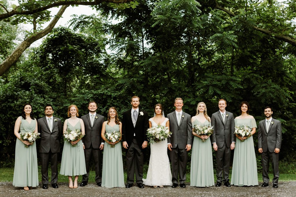 Green and white spring wedding at the Inn at Barley Sheaf || Soft green bridesmaid dresses and charcoal gray suits. || Florals by Love 'n Fresh Flowers in Philadelphia || Photo by Lev Kuperman