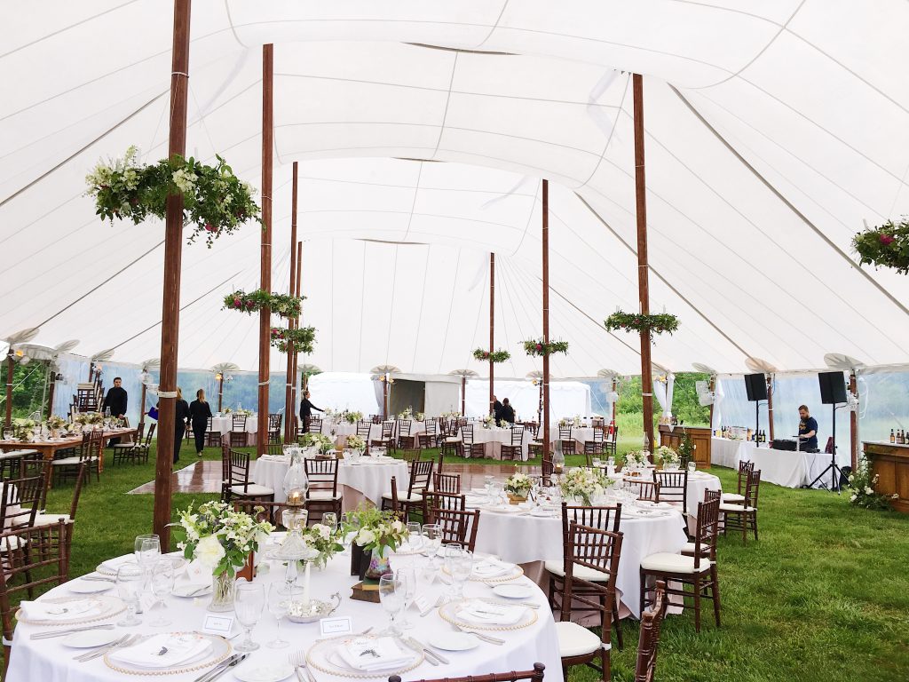 Spring Wedding at the Inn at Barley Sheaf in New Hope PA || Floral hoops or floral chandeliers hung around the posts in the sailcloth tent for the wedding reception || Florals and Photo by Love 'n Fresh Flowers
