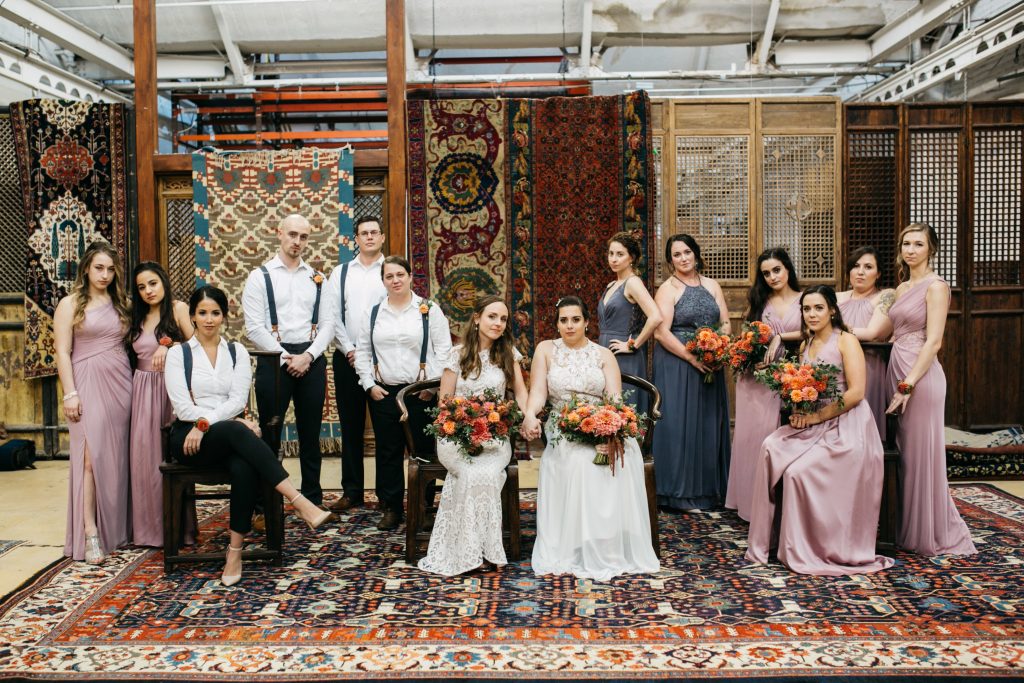 Fun and funky mixed bridal party for a same-sex wedding. | Material Culture Colorful Same-Sex Wedding | Philadelphia | Flowers by Love 'n Fresh Flowers | Photo by Peach Plum Pear Photography