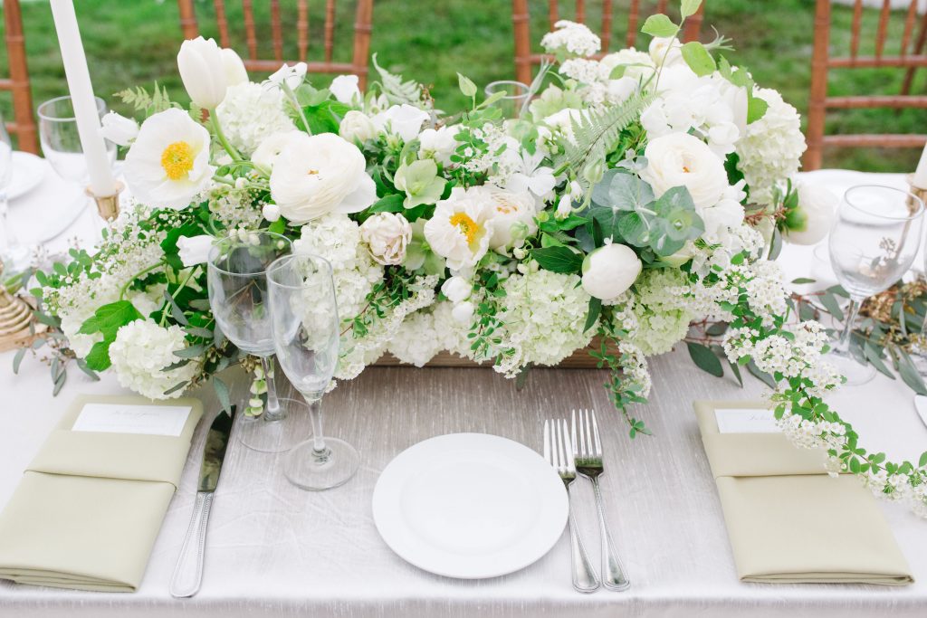 Spring Backyard Wedding | Philadelphia | Green and white spring centerpiece featuring peonies, viburnum, poppies, tulips, spirea, ferns and eucalyptus Florals by Love 'n Fresh Flowers | Photo by Asya Photography