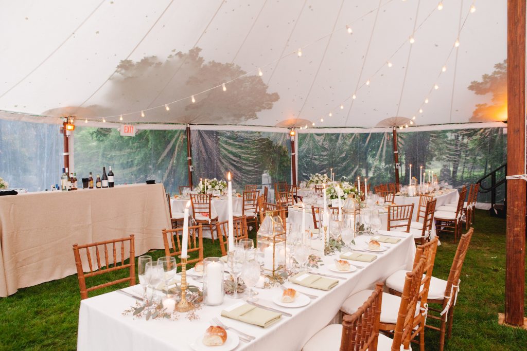 Spring Backyard Wedding | Philadelphia | Long tables at wedding in a sail cloth tent | Florals by Love 'n Fresh Flowers | Photo by Asya Photography