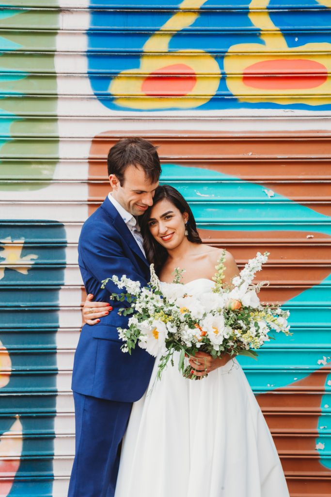 MAAS Building Wedding Philadelphia || Bridal bouquet by Love 'n Fresh Flowers || Photo in front of Fishtown Murals by Michelle Johnsen Photography