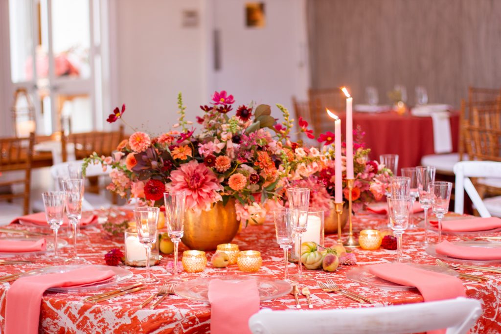 Coral and red wedding centerpiece at Pomme in Radnor Philadelphia | Photo and flowers by Love 'n Fresh Flowers, a Philadelphia florist dedicated to sustainable wedding practices.