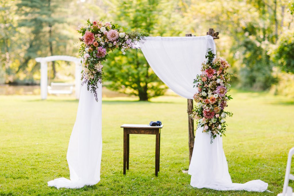 Inn at Barley Sheaf Wedding | New Hope PA| Lush and colorful summer chuppah with fabric draping | Flowers by Love 'n Fresh Flowers | Photo by Redfield Photography