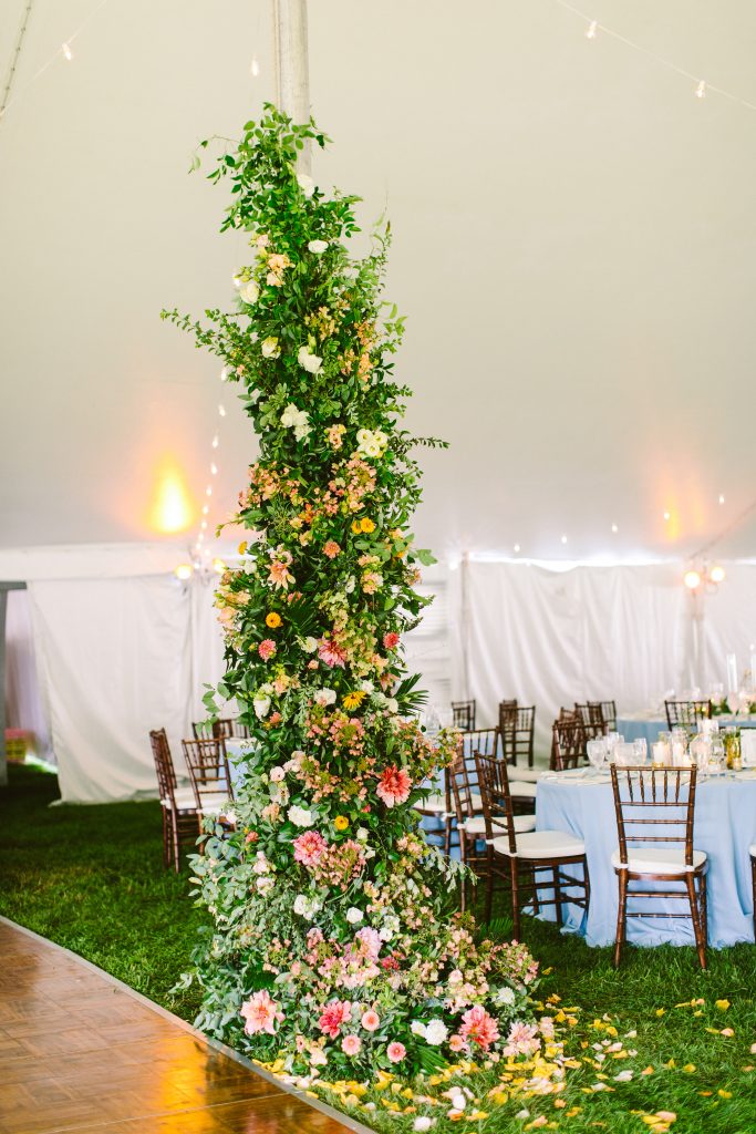 Inn at Barley Sheaf Wedding | New Hope PA| Lush overgrown flowers on the tent pole at this summer wedding | Flowers by Love 'n Fresh Flowers | Photo by Redfield Photography