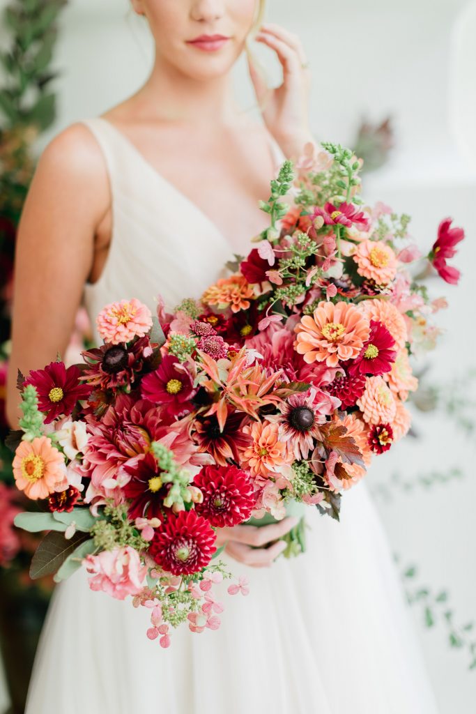 Colorful summer wedding inspiration at Pomme in Radnor | Red and Coral Bridal Bouquet |Flowers by Love 'n Fresh Flowers | Photo by Emily Wren Photography